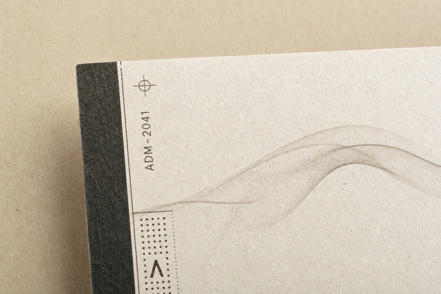 Harvest labels and saturation marks on a pale mineral surface